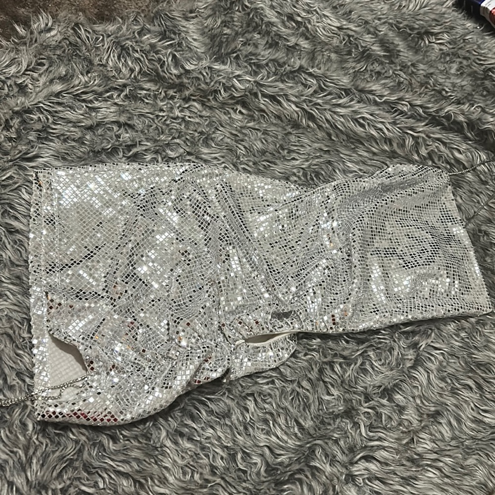 Silver.. New. Never worn,without tags!